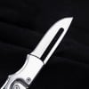 Stainless steel folding mechanical magic knife