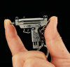 Mini Uzi Keychain-Keychain that changes magazines