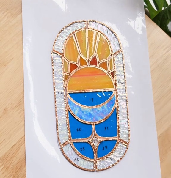 Verdant Radiance: Handcrafted Stained Glass Suncatcher and Plant Grower