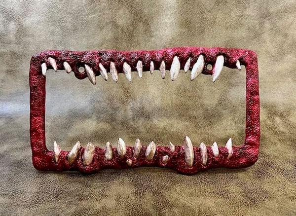 Creature teeth license plate