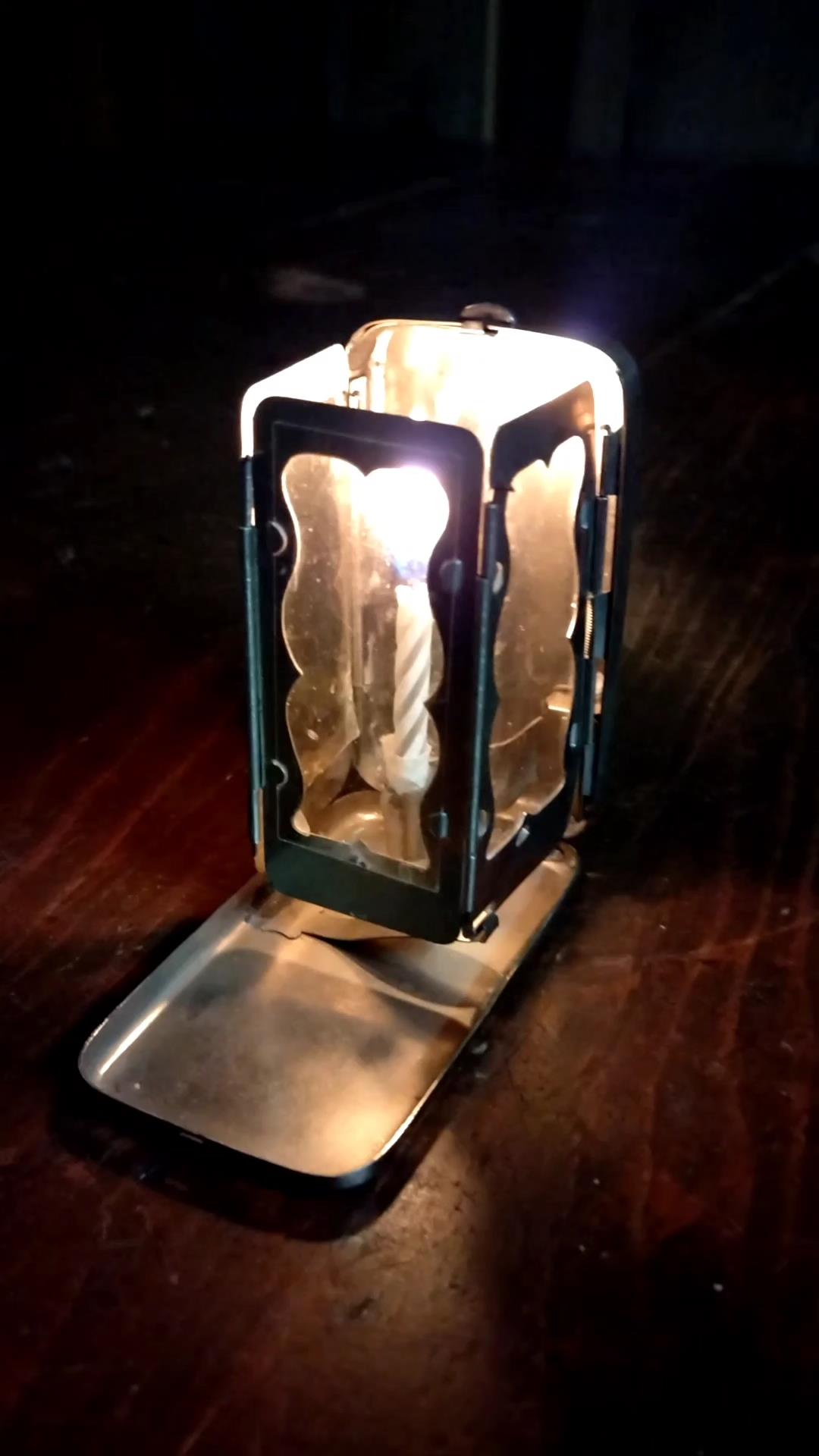 Folding pocket candle lantern