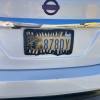 Creature teeth license plate