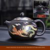 Purple clay pot that changes color when exposed to heat, Xishi Fengming pot, Kung Fu tea set, household teapot, Dragon and Phoenix pot, non-hot tea making device