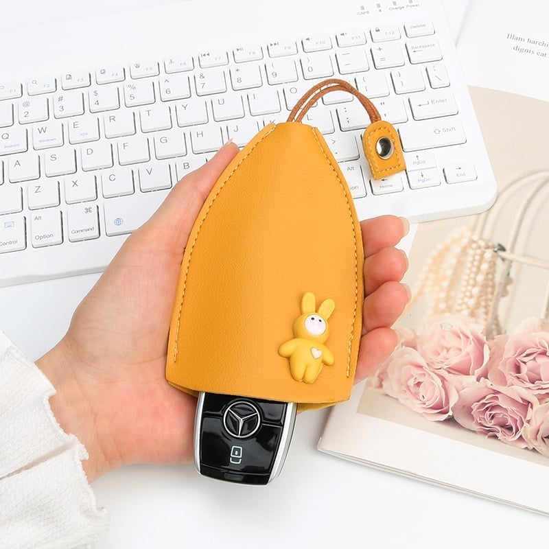 (🎄Christmas Hot Sale🔥🔥)Creative pull-out cute large-capacity car key case(BUY MORE SAVE MROE)