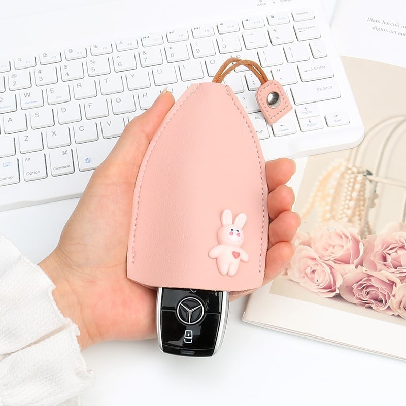 (🎄Christmas Hot Sale🔥🔥)Creative pull-out cute large-capacity car key case(BUY MORE SAVE MROE)