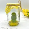 GRUMPY PICKLE IN A JAR SCULPTURE