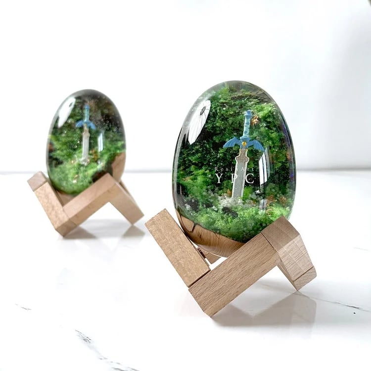 Inspired by the popular video game, Handcrafted Resin Wood Eggs with Rusty Sword Decoration