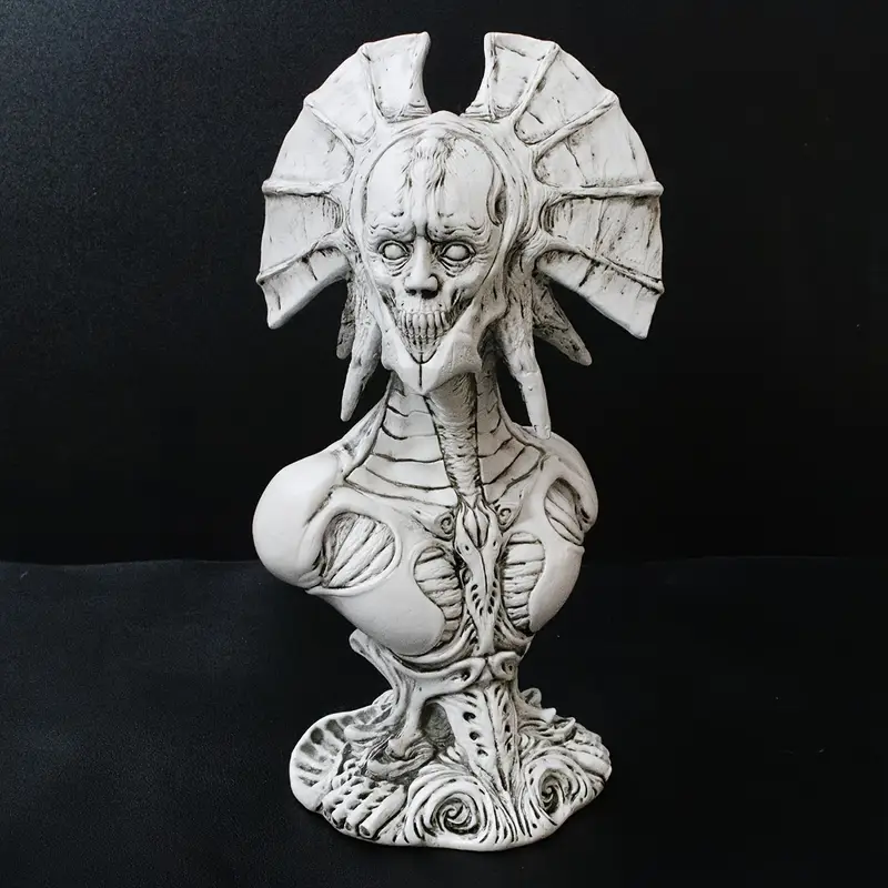 Devil bust statue