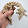 Wiggling Pangolin Ornament – Delightful Motion for Your Home