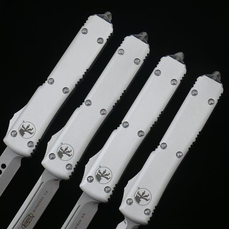 Microtech Silver White Handle OTF Straight Jump Knife