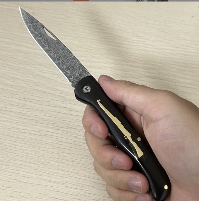 Handmade Damascus ebony handle folding knife