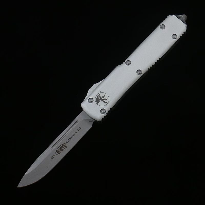 Microtech Silver White Handle OTF Straight Jump Knife