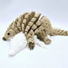 Wiggling Pangolin Ornament – Delightful Motion for Your Home