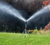 🎁TikTok Last Day Sale - 70% OFF🔥Rotating Tripod Sprinkler