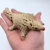 Wiggling Pangolin Ornament – Delightful Motion for Your Home