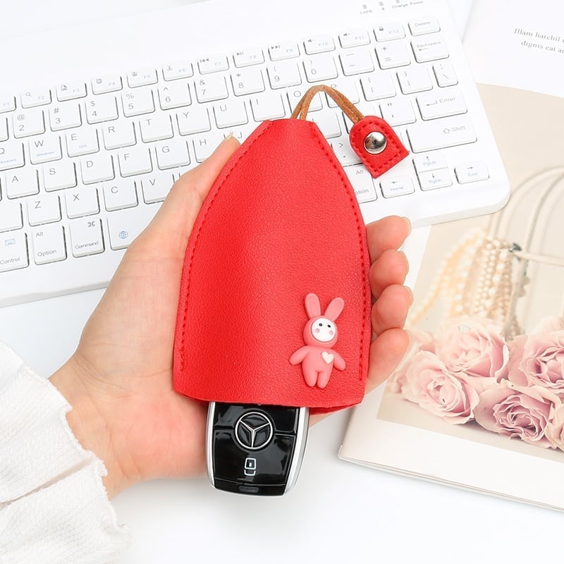 (🎄Christmas Hot Sale🔥🔥)Creative pull-out cute large-capacity car key case(BUY MORE SAVE MROE)