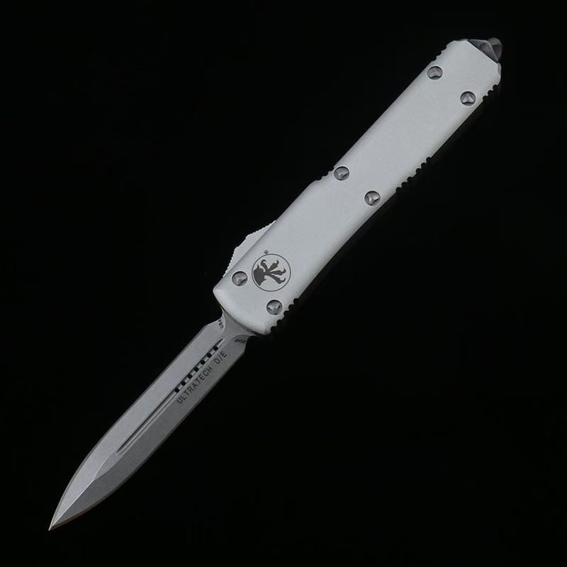 Microtech Silver White Handle OTF Straight Jump Knife