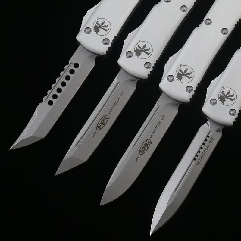 Microtech Silver White Handle OTF Straight Jump Knife