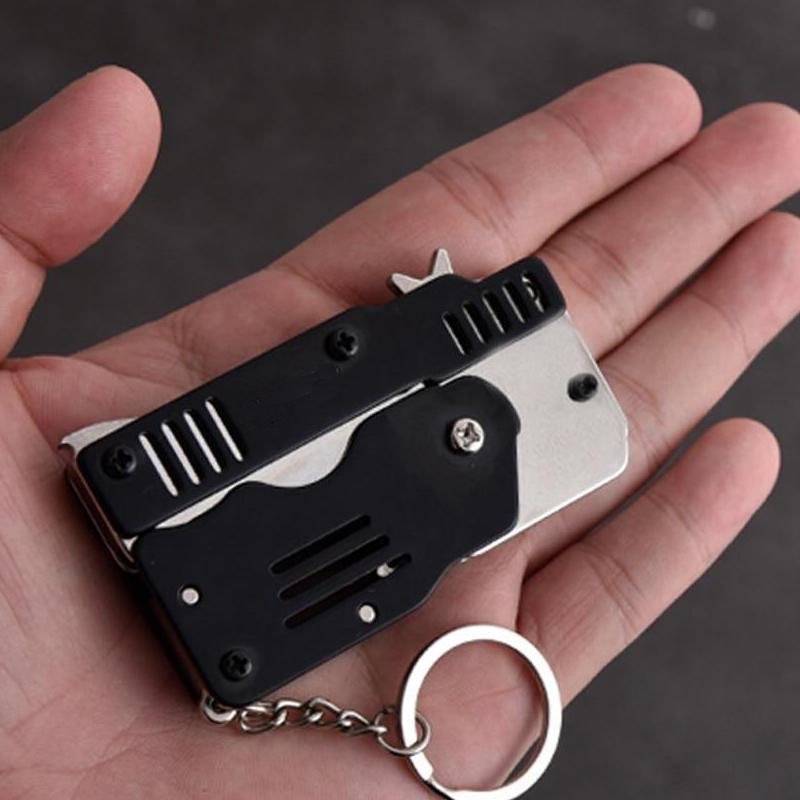 🔥Limited Time Sale 48% OFF🎉Folding Rubber Band Gun Toy Keychain(Buy 3 get extra 20% off)