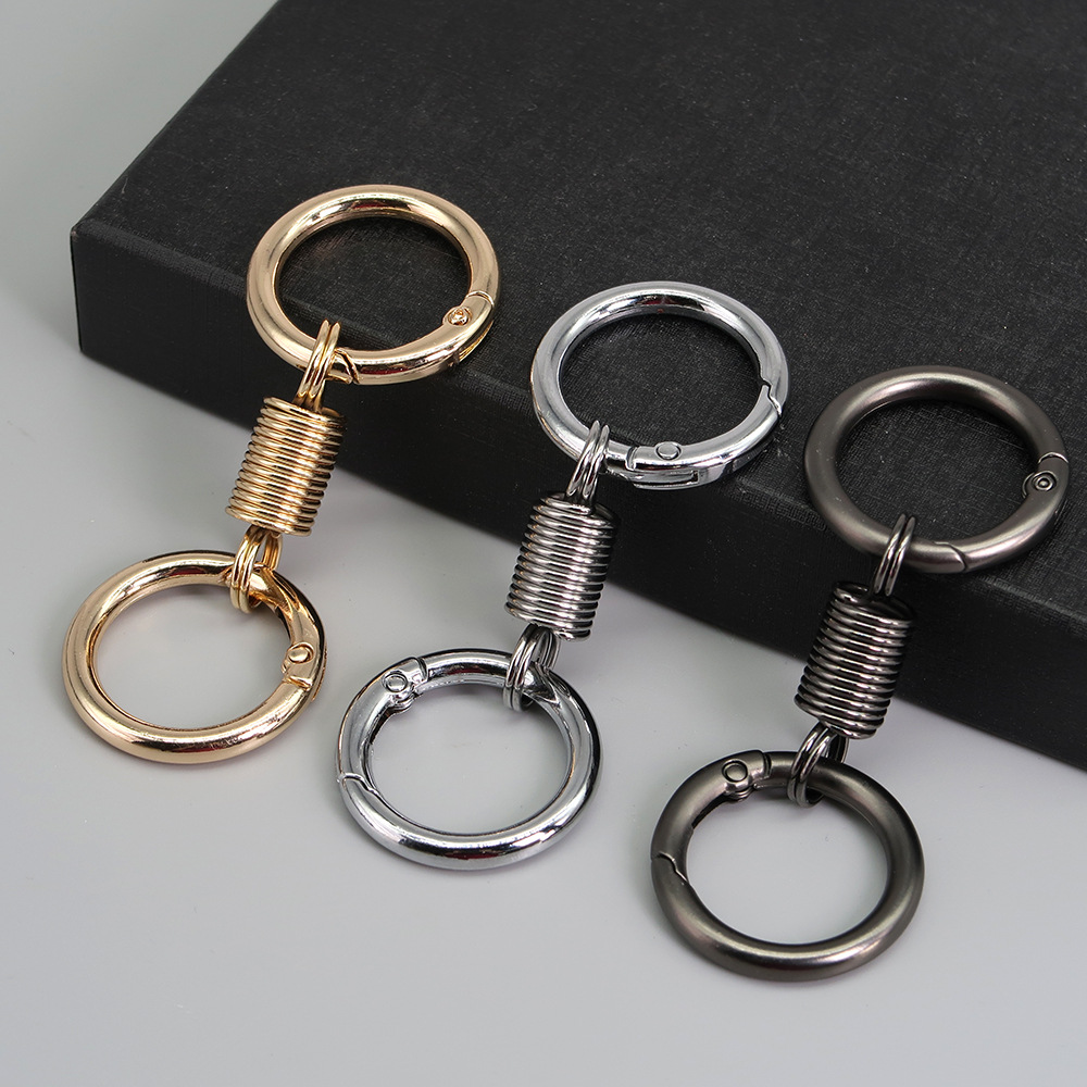 🔥80% OFF- Nordic Double Ring Spring Keychain