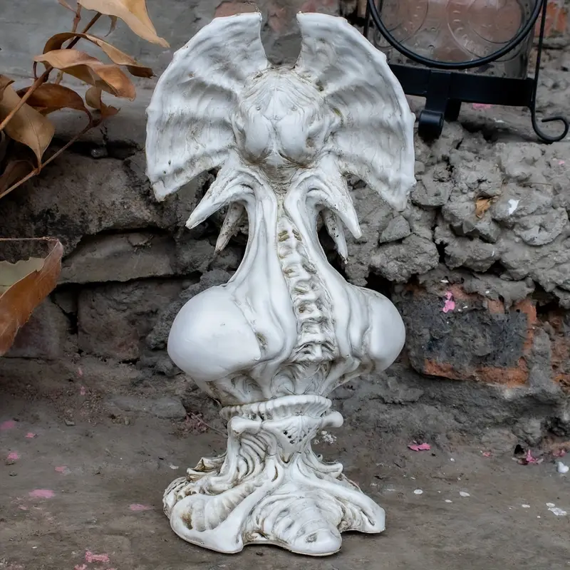 Devil bust statue