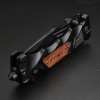Outdoor folding knife with black wooden handle