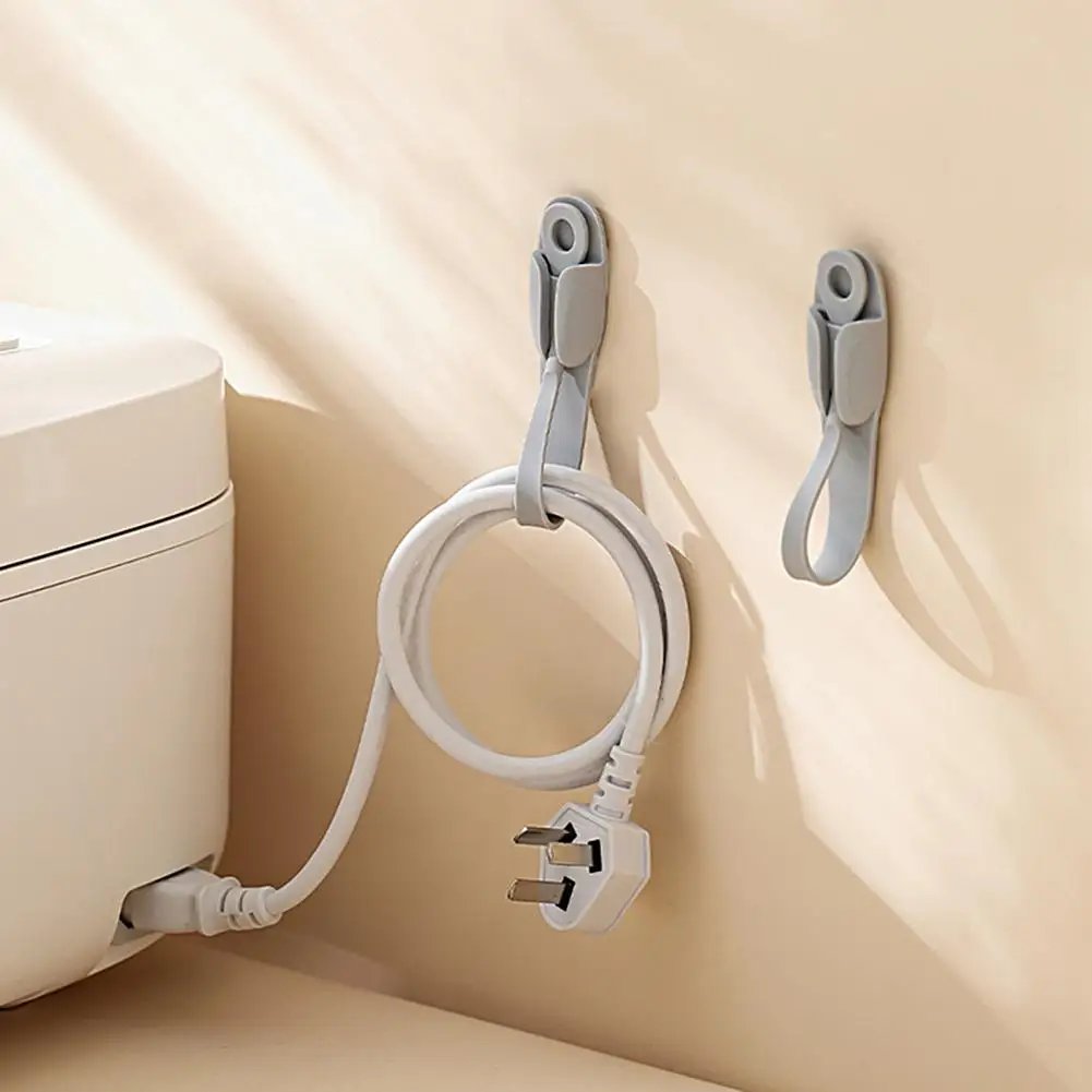 🎅EARLY CHRISTMAS SALE 49% OFF🎄Wall Mounted Punch-free Adhesive Removable Cord Holder Organizer