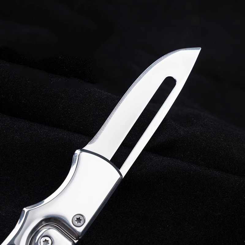 Stainless steel folding mechanical magic knife