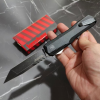Kaxiu OTF self-defense knife