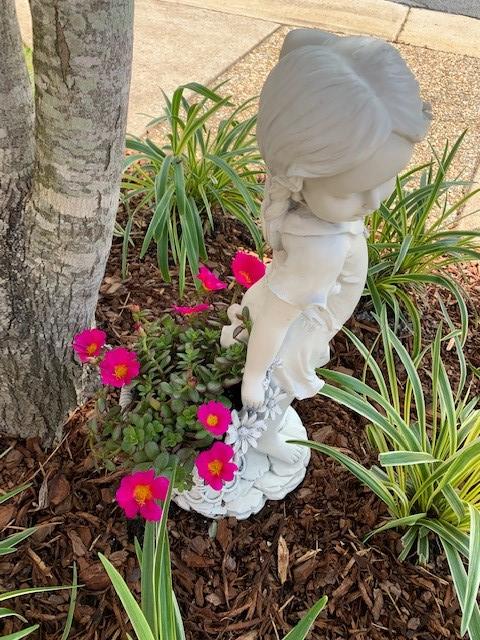 Embrace Childhood with Frances, the Flower Girl Statue