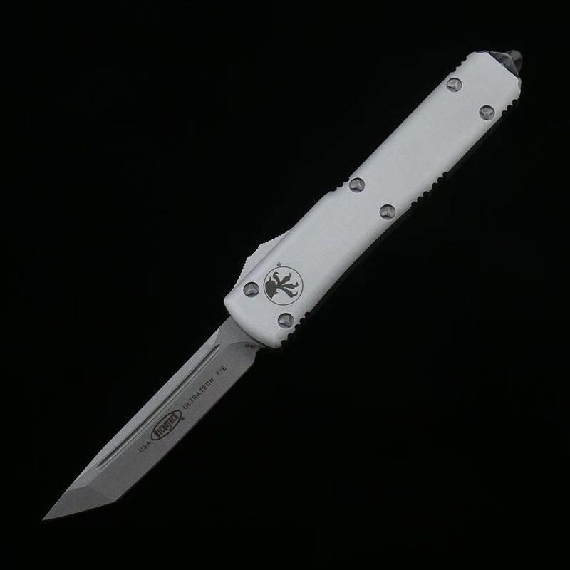Microtech Silver White Handle OTF Straight Jump Knife