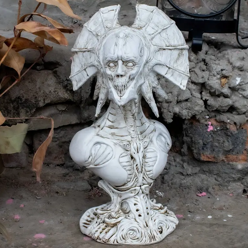 Devil bust statue