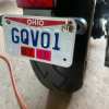 Universal finger license plate screw