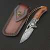 🐺 Damascus Pocket Knife – Handmade VG10 Steel with Abalone Shell Handl