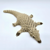 Wiggling Pangolin Ornament – Delightful Motion for Your Home