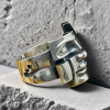 Split-Persona Mask Silver Ring