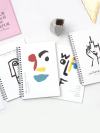 Abstract Face Print Spiral Notebook 1 pack