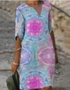 Mediumlength slim print dress with 5-quarter sleeves and V-neck